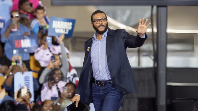 Film and TV director Tyler Perry appears during Democratic presidential candidate Kamala Harris’ rally at James R. Hallford Stadium in Clarkston on Thursday, October 24, 2024. (Arvin Temkar / AJC)